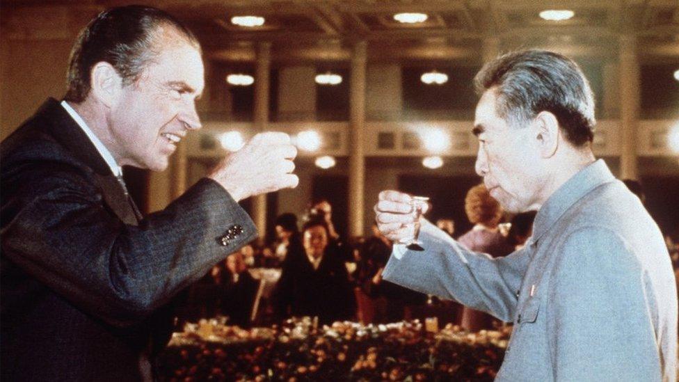 Richard Nixon (L) toasts with Chinese Premier Zhou Enlai (R) during his trip to China in February 1972.