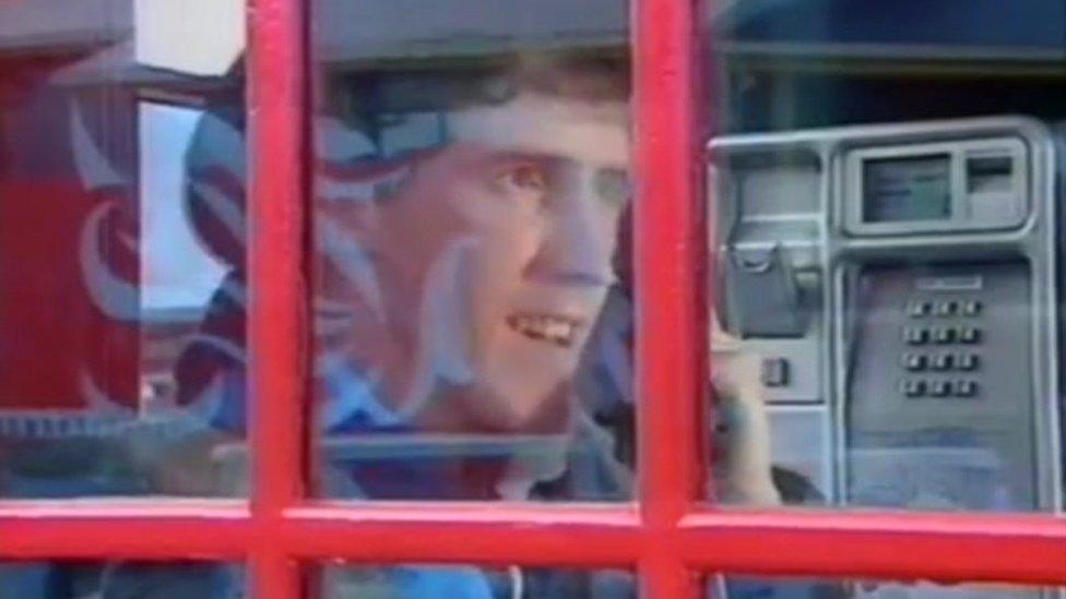 Rob Brydon in a phone box