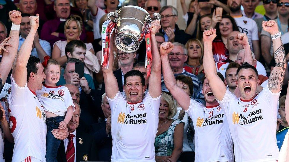 Seán Cavanagh holds aloft the Anglo-Celt Cup in 2017