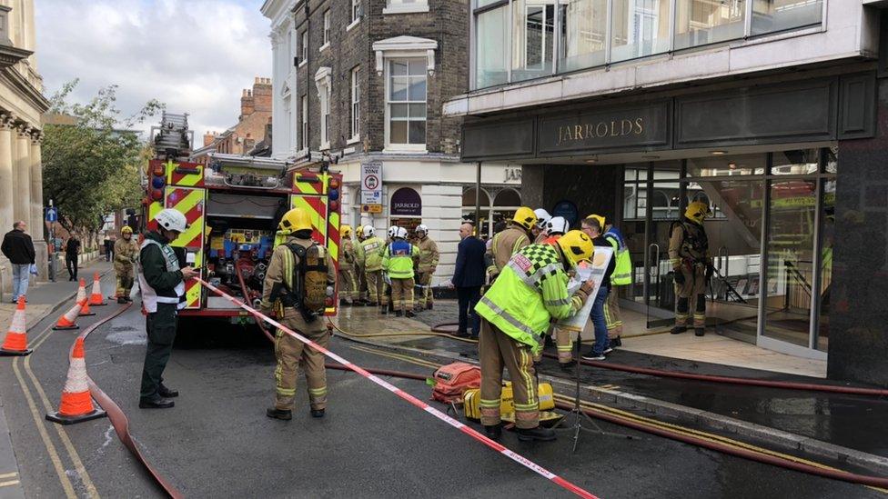 Fire fighters outside Jarrold in Norwich