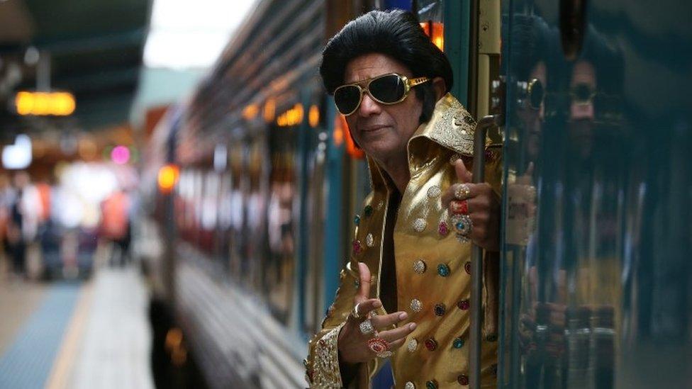 Elvis tribute artist Alfred Kaz, also known as "Bollywood Elvis" poses at Central Station ahead of boarding the "Elvis Express" on January 10, 2019 in Sydney, Australia