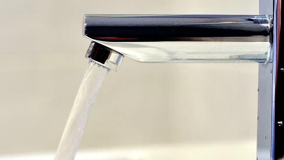 A tap with water coming from it