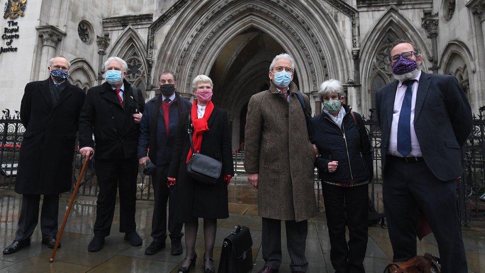 Some of the appellants at court on Wednesday with their supporters and lawyers