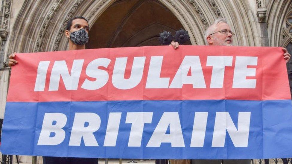 Insulate Britain protestors outside the Royal Courts of Justce