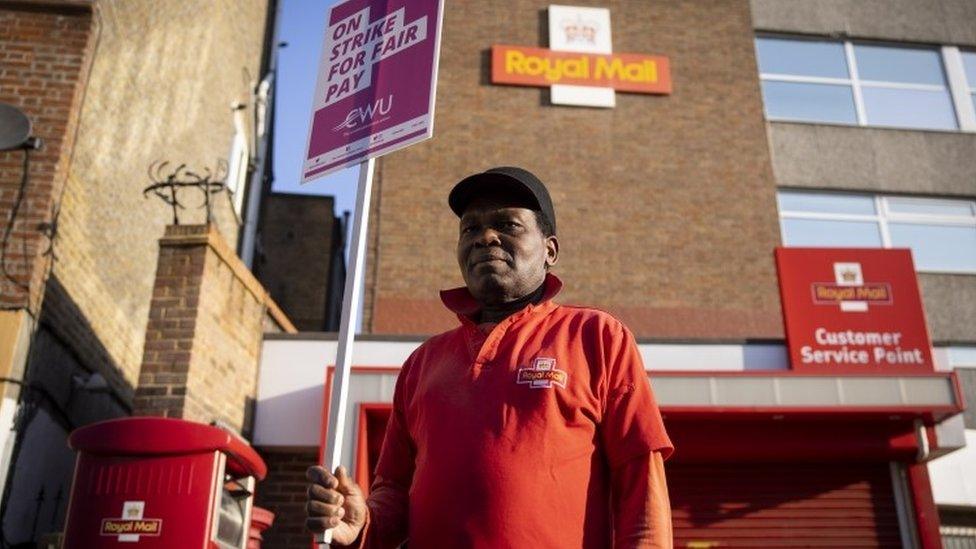 Post office worker on strike