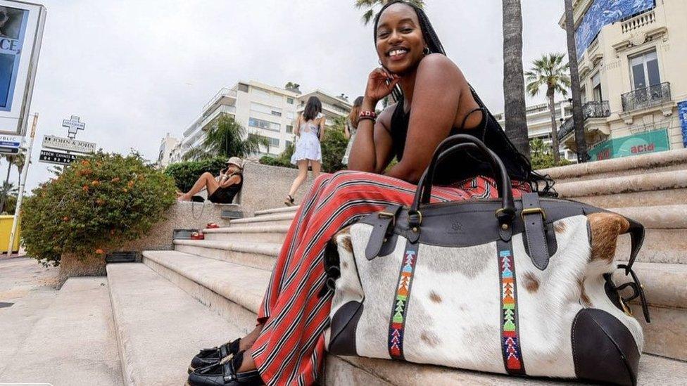 Nthenya Mwendwa with one of her cow hide bags