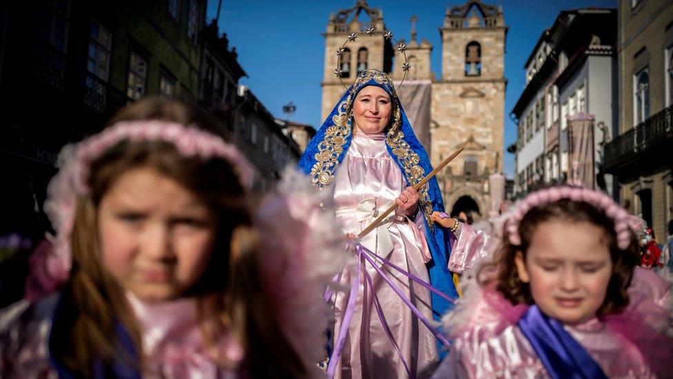 Faithful take part in a procession on the Palm Sunday, Braga, Portugal, 10 April 2022. Palm Sunday for Christians around the world marks the biblical account of the entry of Jesus Christ into Jerusalem, signaling the start of the Holy Week leading to Easter Sunday.