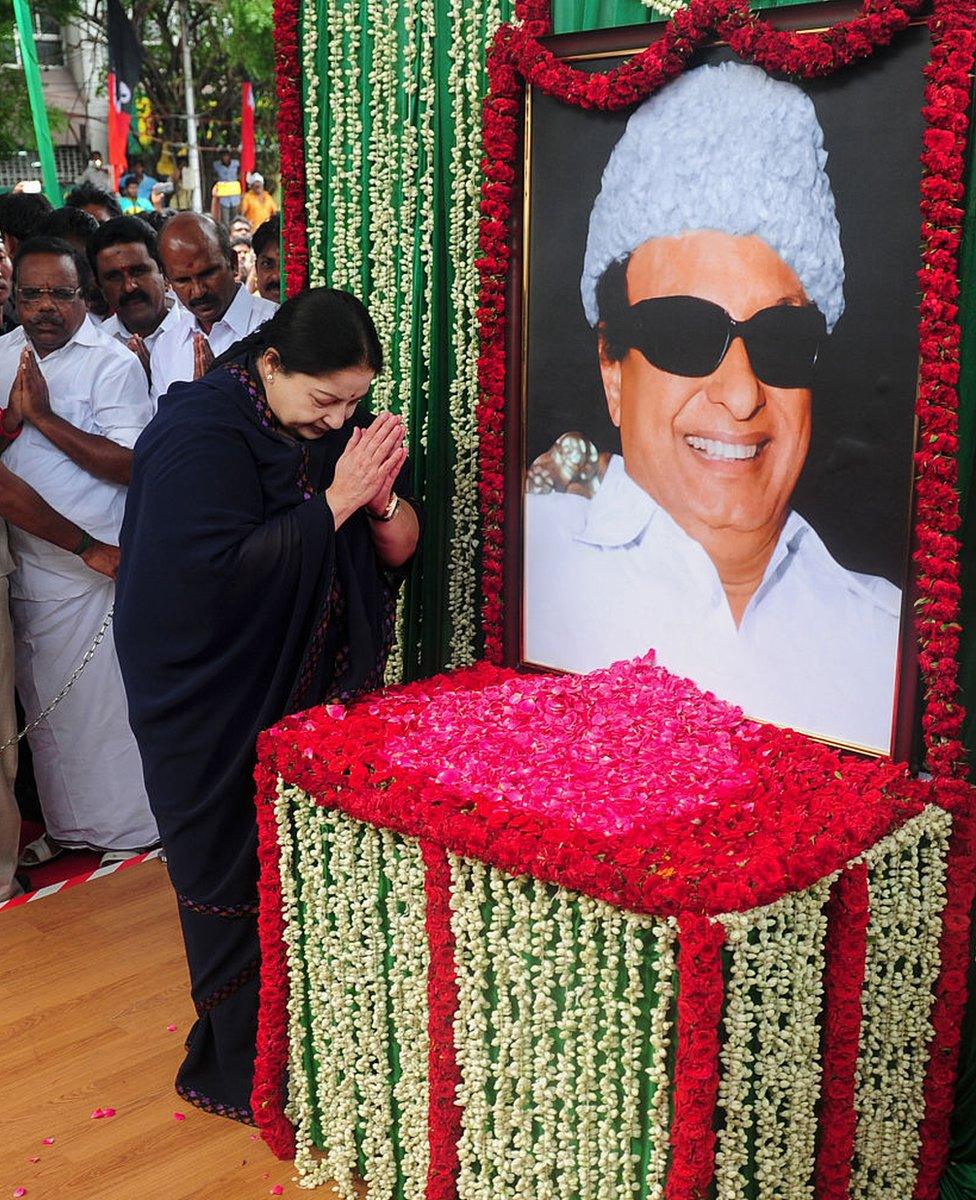 Jayalalithaa Jayaram, leader of the All India Anna Dravida Munnetra Kazhagam (AIADMK), visits a portrait of party founder M.G. Ramachandran in Chennai on May 20, 2016. The former movie star known as 'Amma' (Mother) has long enjoyed a huge following in prosperous Tamil Nadu where she has won three terms as chief minister since 1991.