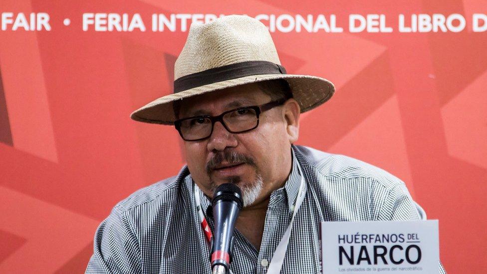 A file photo from November 2016 shows Javier Valdez at the launch of his book Huerfanos del narco