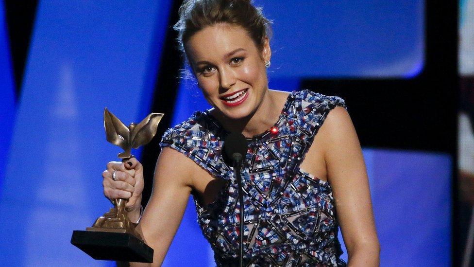 Brie Larson collects her best actress award at the Independent Spirit Awards