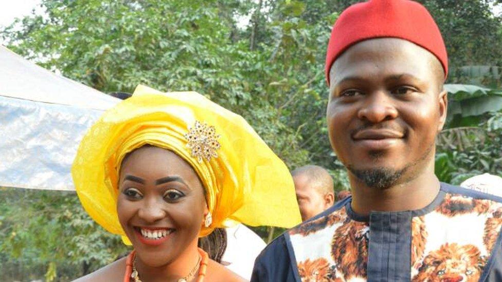 The couple on their wedding day in Igbo attire