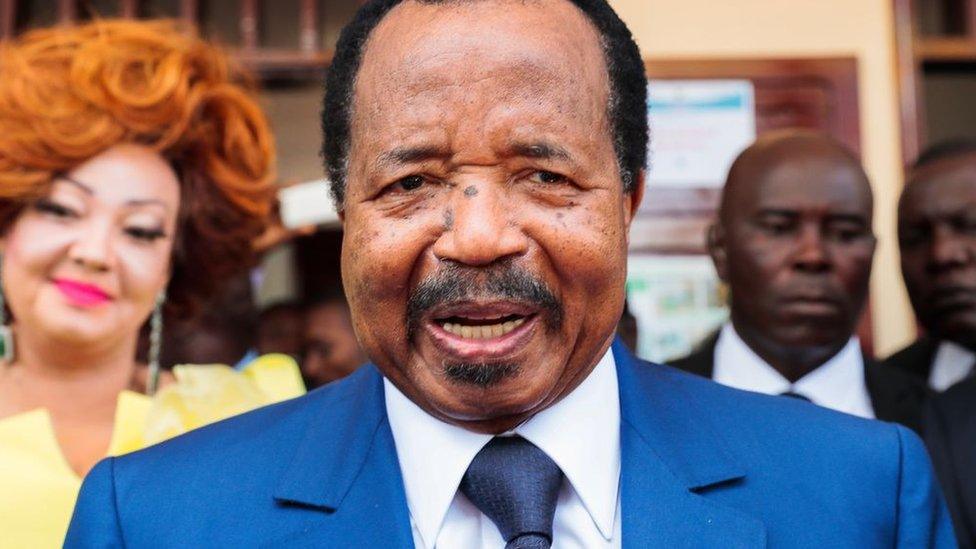 Cameroon's President and head of Cameroon People's Democratic Movement Paul Biya speaks to media after casting his vote at a polling station during presidential elections in Yaounde, Cameroon on October 07, 2018.