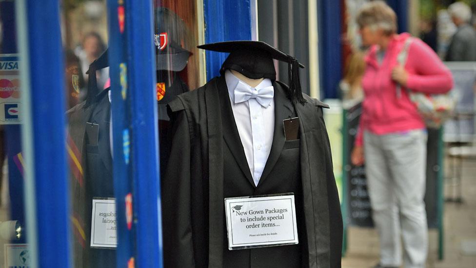 A gown and cap outside a shop at University of Oxford