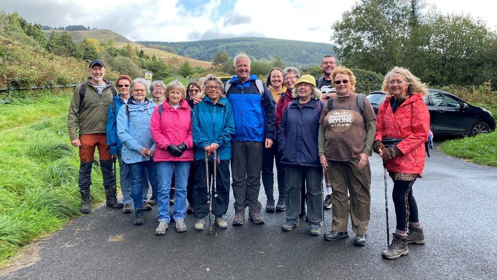 Derek Brockway with the Social Strollers walking group