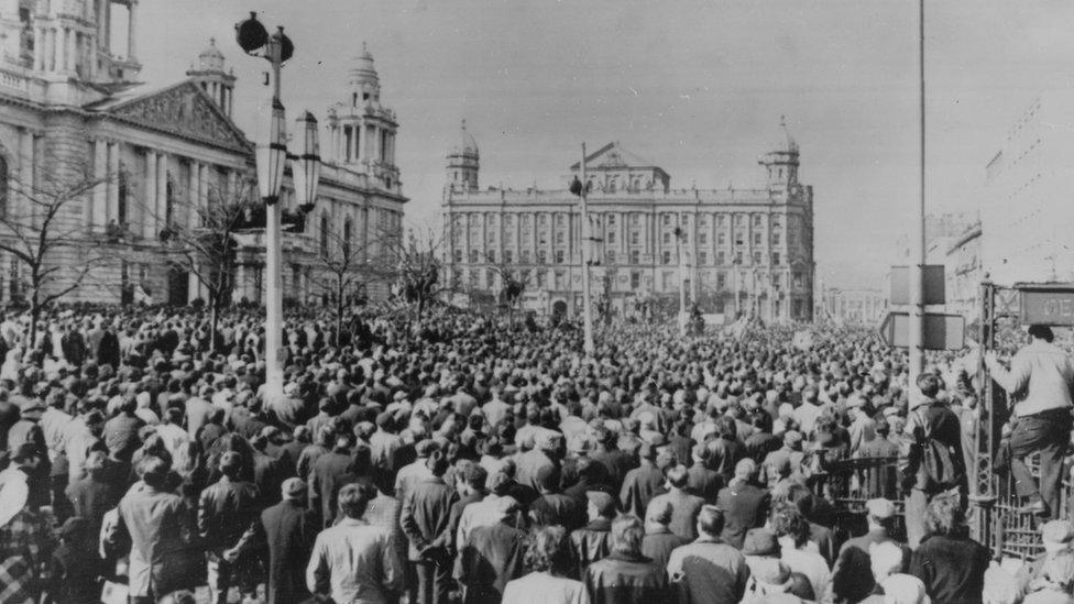 Crowds at Donegall Square in Belfast, listen to Ulster Vanguard leader William Craig address them during the General strike