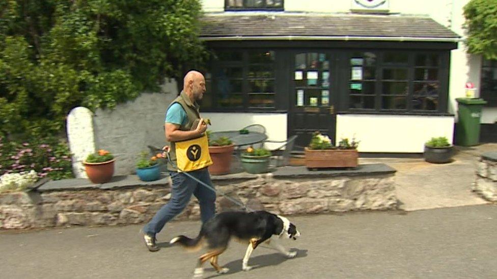 Nigel with dog and gosling en route to the pub