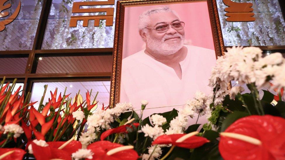 A photograph of the late former Ghana President Jerry John Rawlings displayed during the laying in state at the Accra International Conference centre, on 25 January 2021