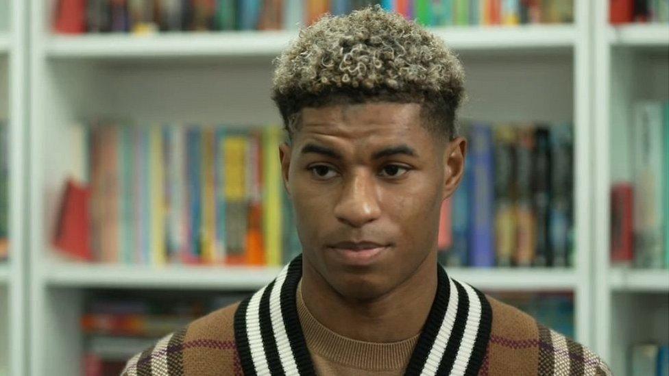 Marcus Rashford in school library