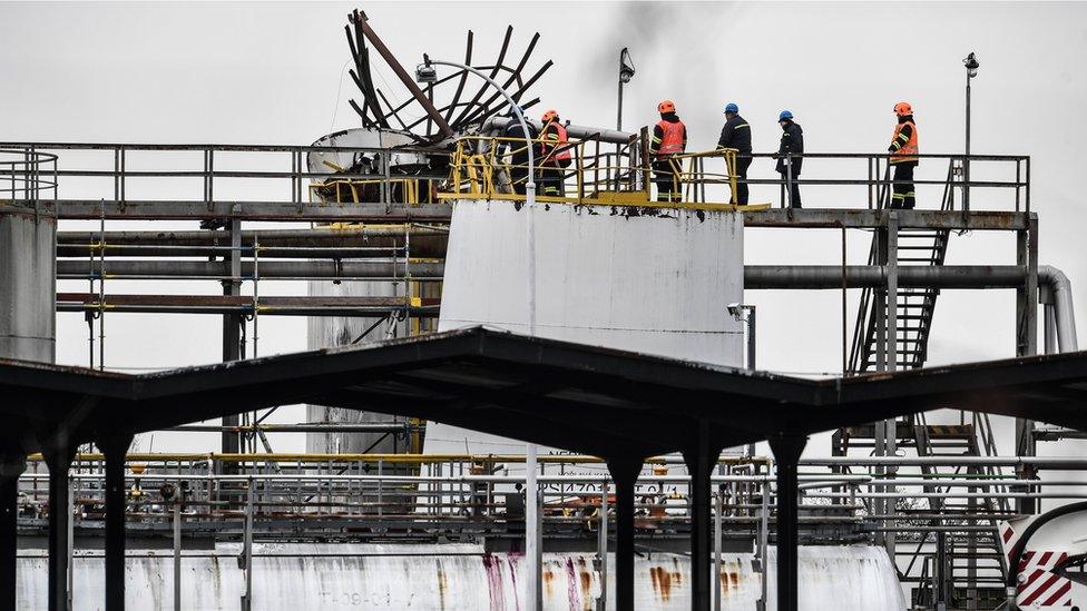 Emergency workers at the scene of the Unipetrol chemical plant blast in Kralupy nad Vltavou