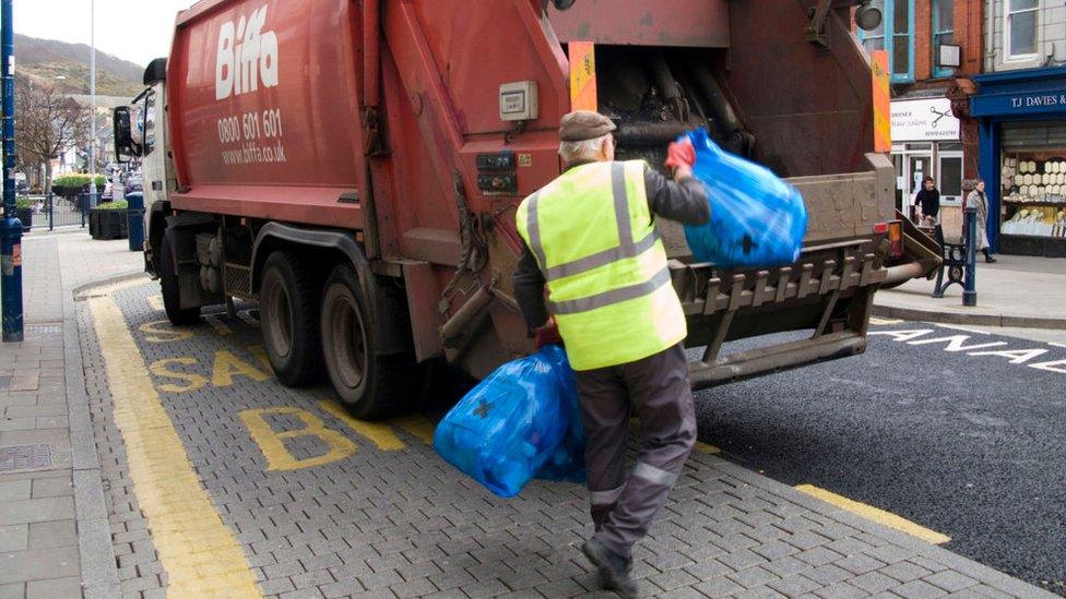 Waste being thrown into Biffa truck