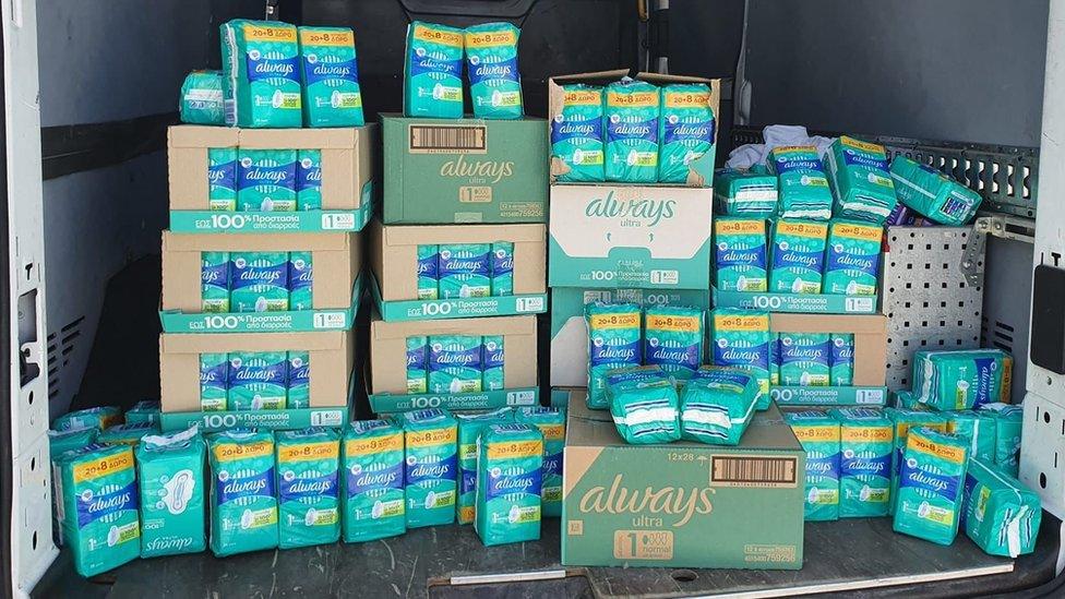 A large number of disposable sanitary products in a van