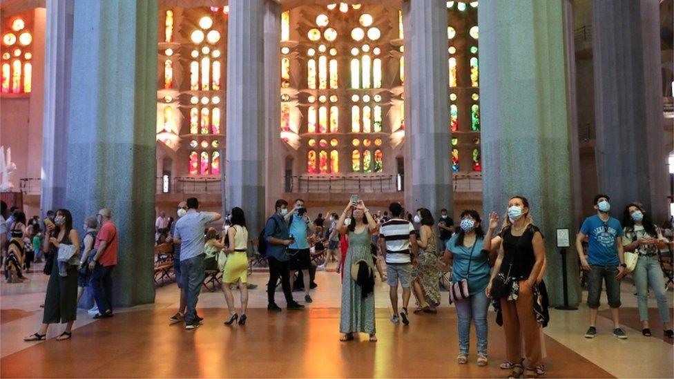 Healthcare workers and off duty police officers were among those granted access to the Sagrada Familia basilica in Barcelona on Saturday