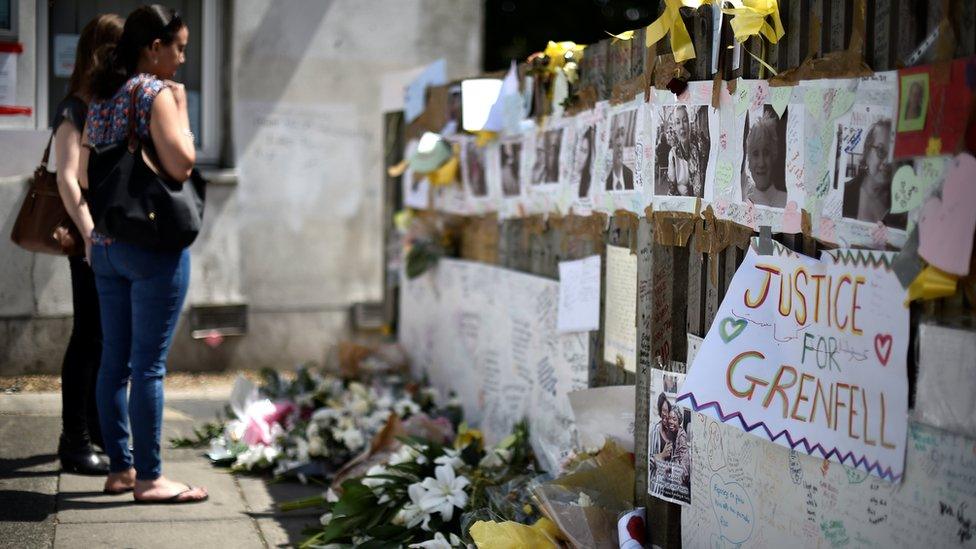 A display of tributes to victims of the Grenfell Tower fire, taken in the week after the disaster