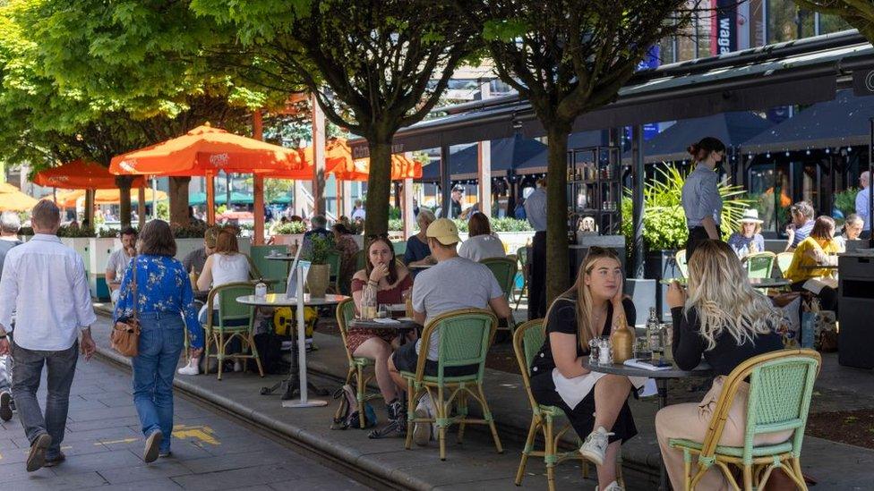 People dining outside in Cardiff