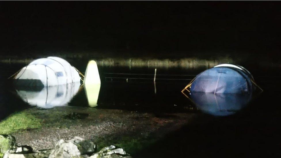 The campers' tents had become submerged in water during the yellow weather warning