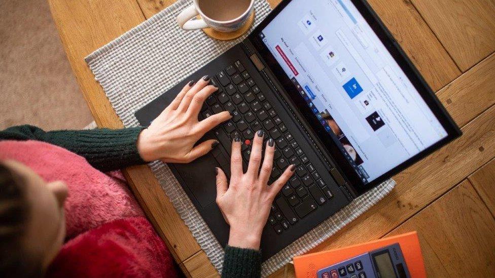 woman working from a laptop from home