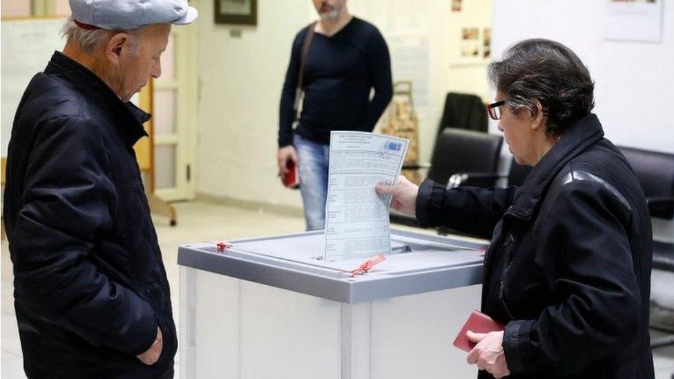 Voters cast ballots