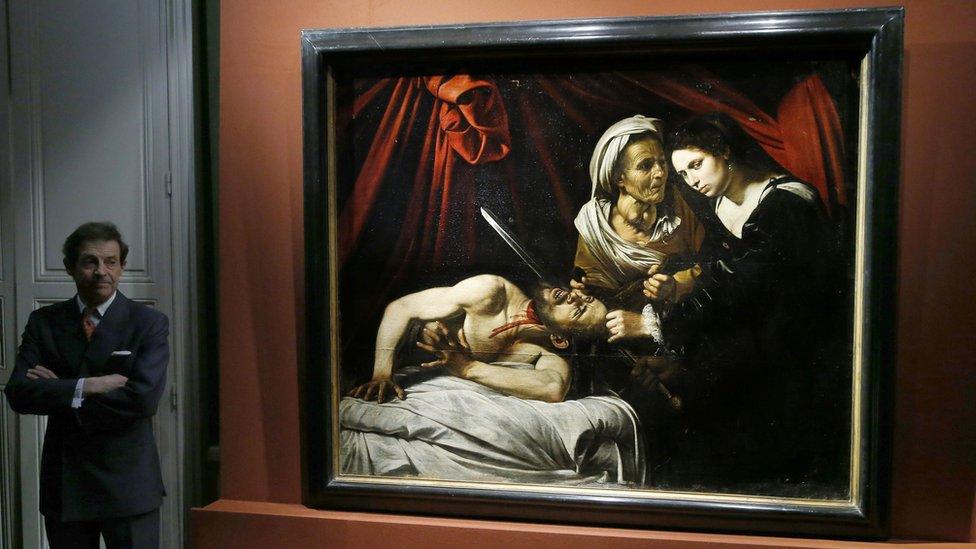 Eric Turquin and painting thought to be Judith Beheading Holofernes, 1599, Caravaggio (detail)