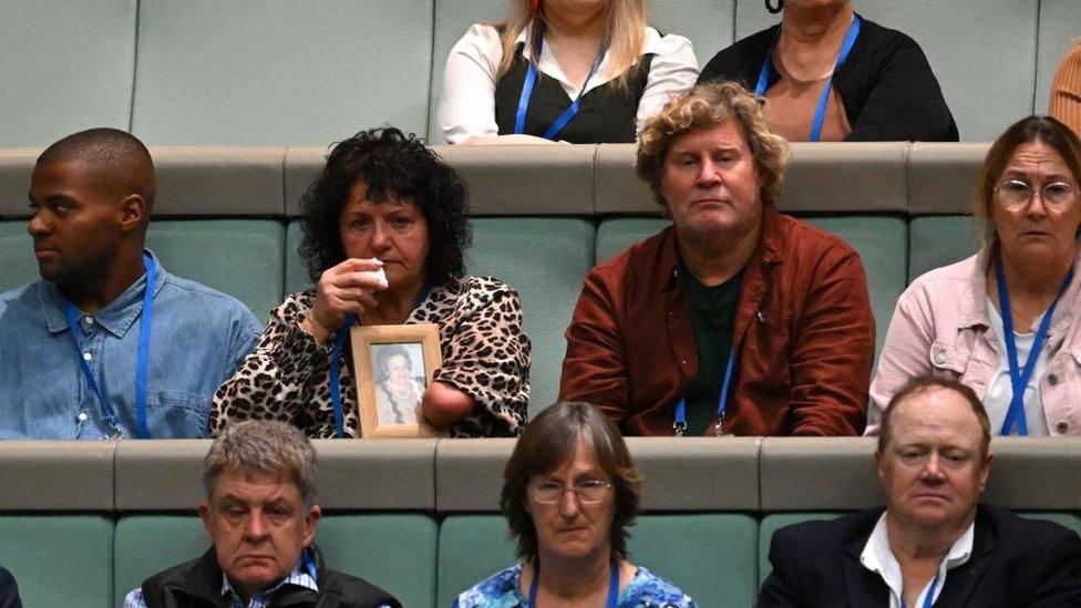 Thalidomide survivors sit in Parliament House