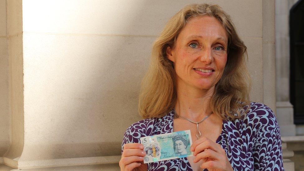 Victoria Cleland holding new fiver