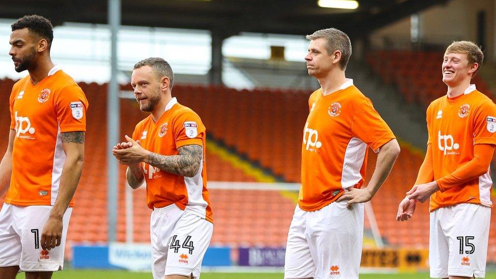 Kevin Stuart (second from right) with Blackpool FC players