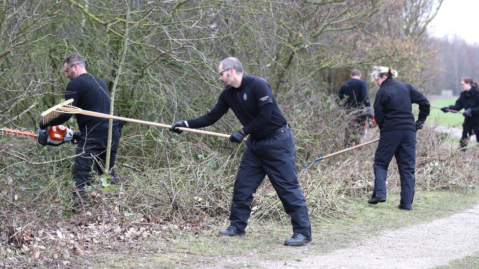 Police search an area near the Oak Road Playing Fields