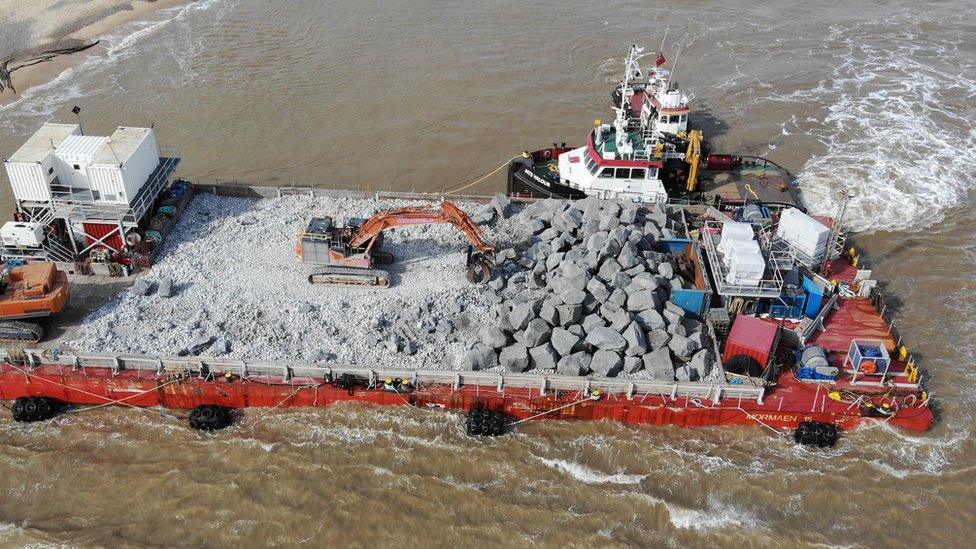 Boulders on barge