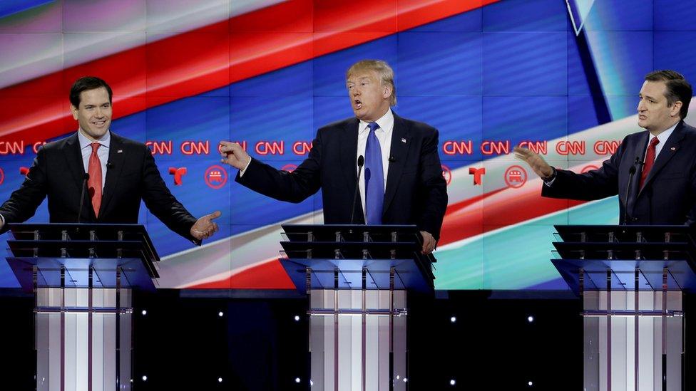 Republican presidential candidate, Sen. Marco Rubio, R-Fla., Republican presidential candidate, businessman Donald Trump and Republican presidential candidate, Sen. Ted Cruz, R-Texas, speak and gesture during a Republican presidential primary debate at The University of Houston, Thursday, Feb. 25, 2016, in Houston