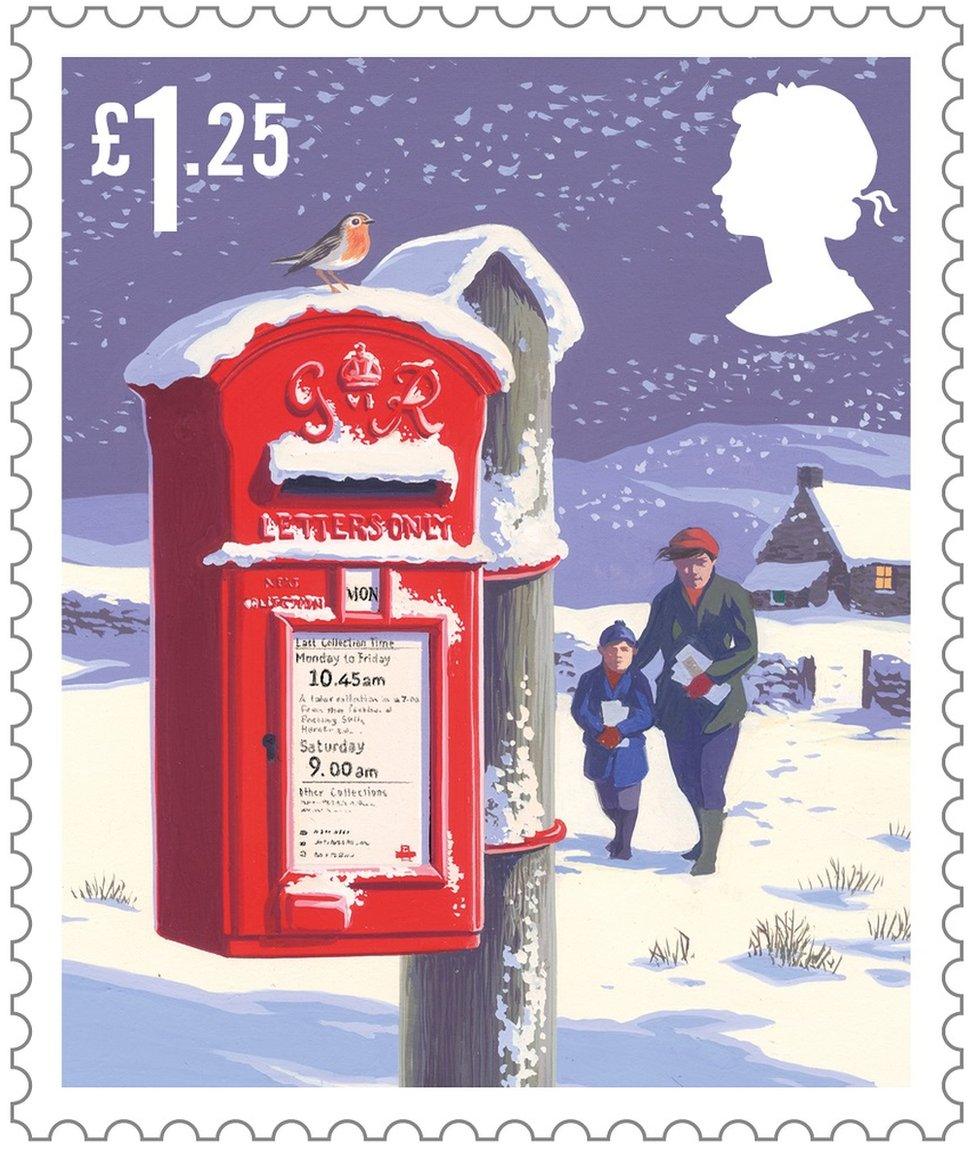 Christmas scene stamp featuring a post box and a mother and son heading to post christmas cards.