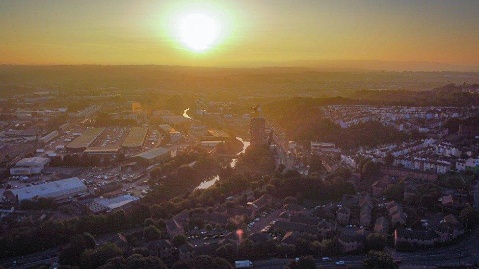 The sun rises over colourful houses in Totterdown, Bristol, on 5 September 2023