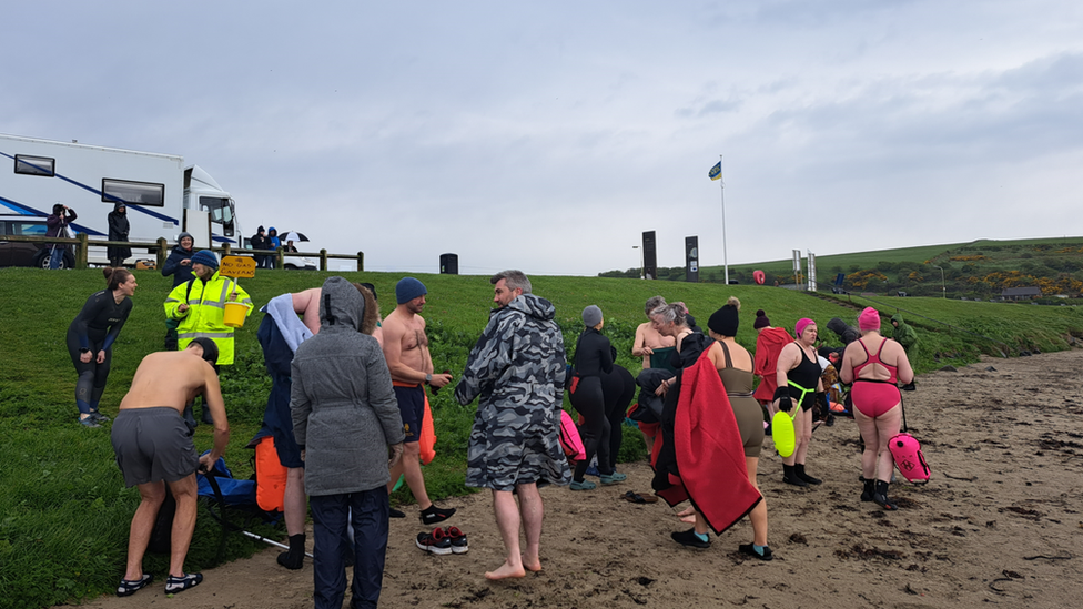 Swimmers on the beach near Islandmagee