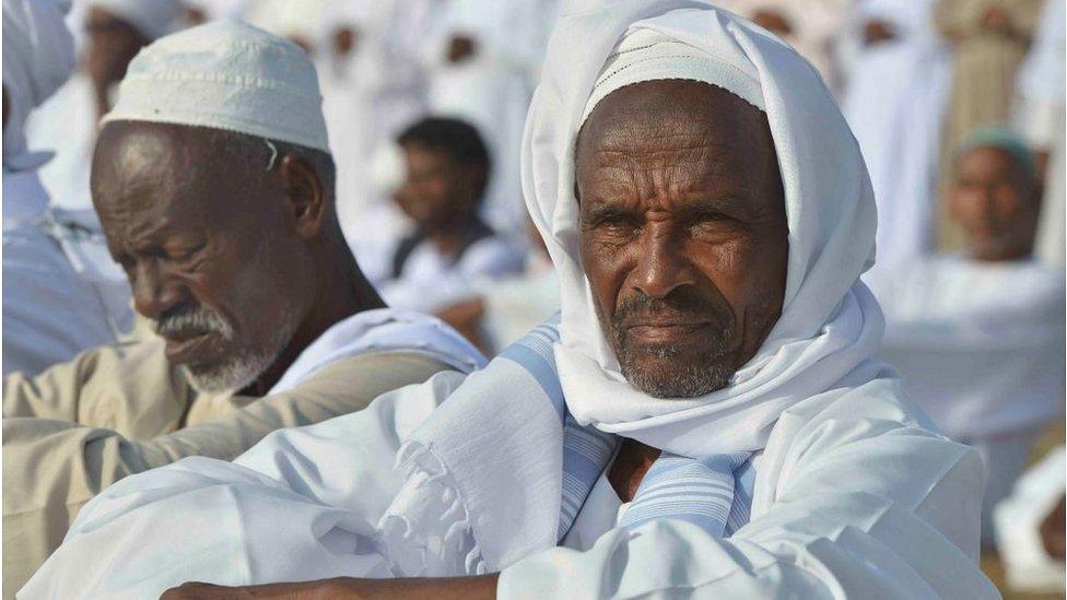 Man with traditional white clothing