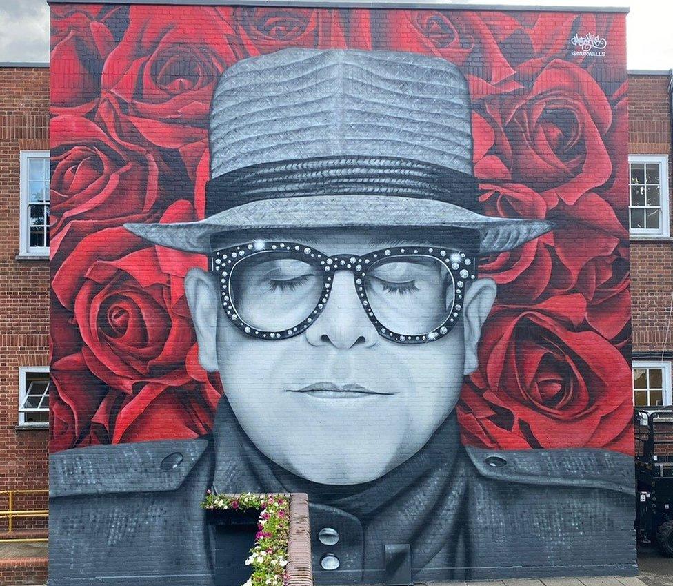 Mural of Sir Elton John on the side of Watford library