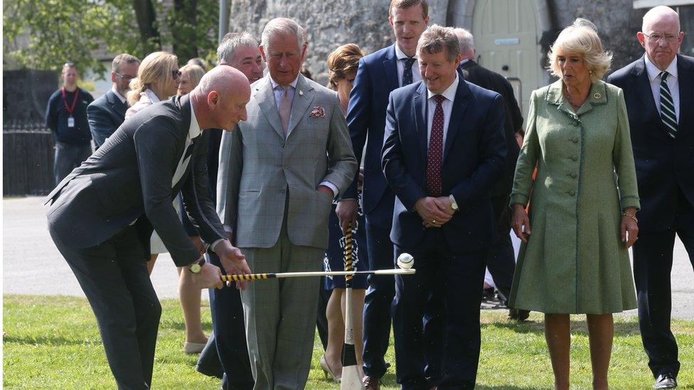 Prince Charles watching a hurling demonstration at Kilkenny Castle