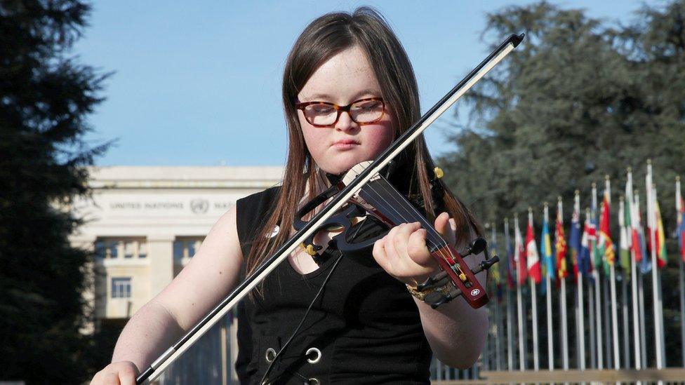 Pearl Luethy playing the violin.