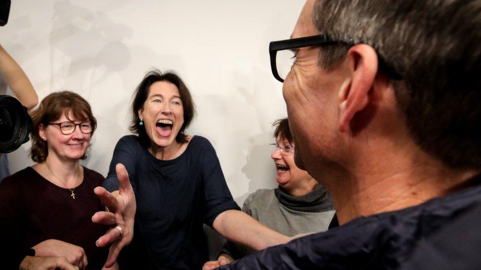 German Jens Söring (R) arrives at Frankfurt airport after his release from a US prison, 17 December 2019