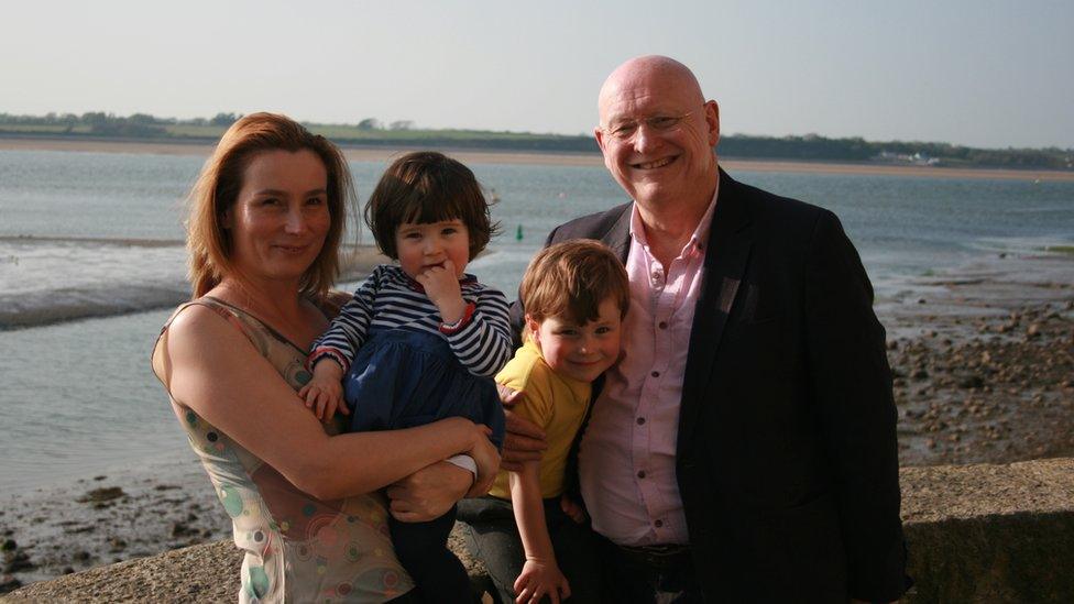 Hywel Williams with his family