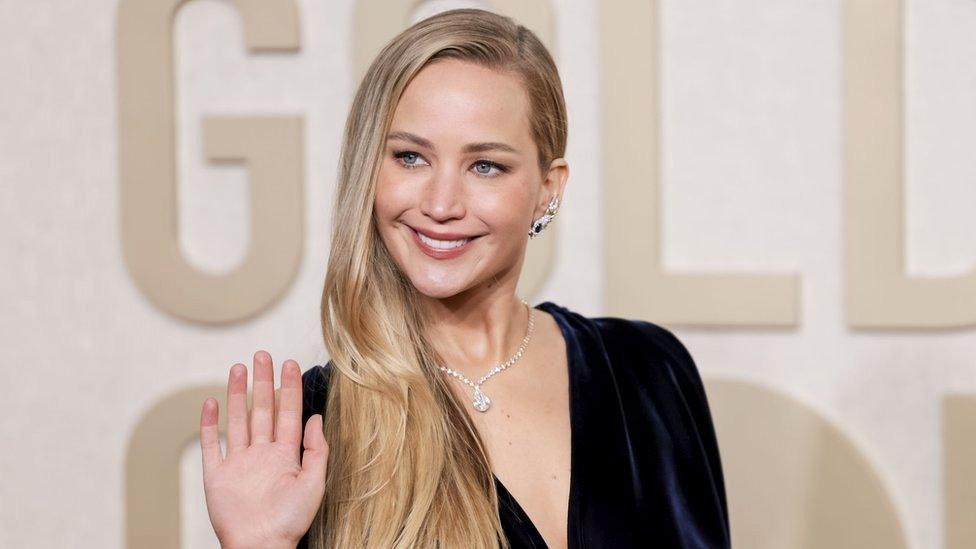 Jennifer Lawrence arriving at the Golden Globes