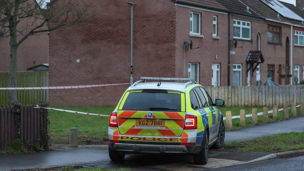 A police car at the scene in Woodland Walk, Limavady