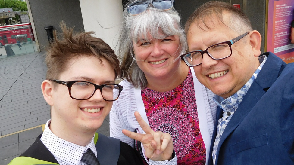 Oli Amess and his parents